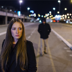 Woman walking at night